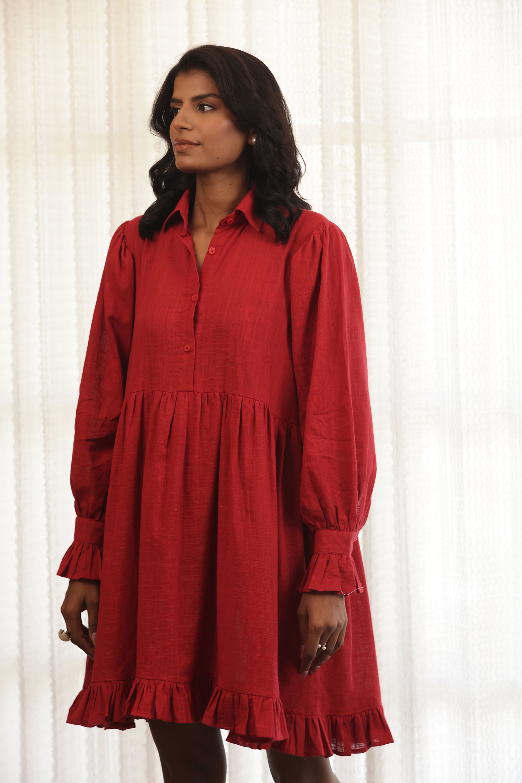 A vibrant red button down dress. Namaste Loom